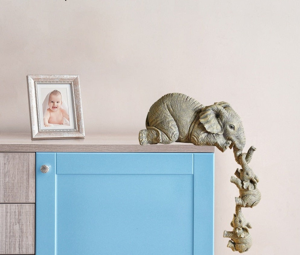 פסלון אמא פילה והילדים